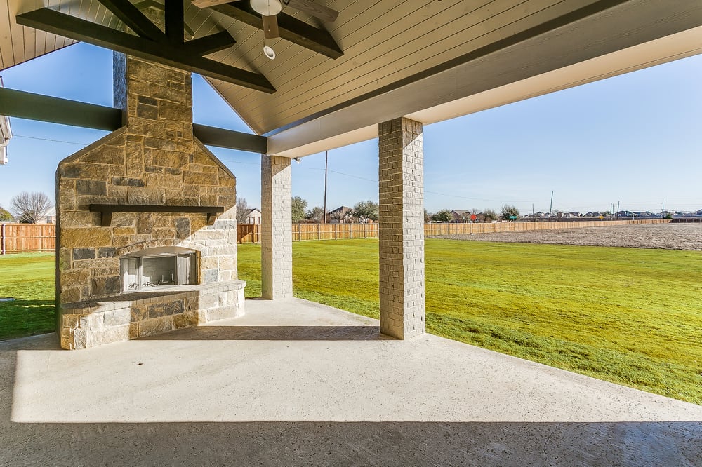 outdoor patio, outdoor fireplace, outdoor space, new homes for sale, john houston custom homes, floor plans, customization, midlothian, waxahachie, mansfield, arlington, burleson, waco, hewitt, mcgregor